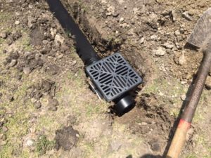 Drainage contractor Arlington TX, installs French drains.
