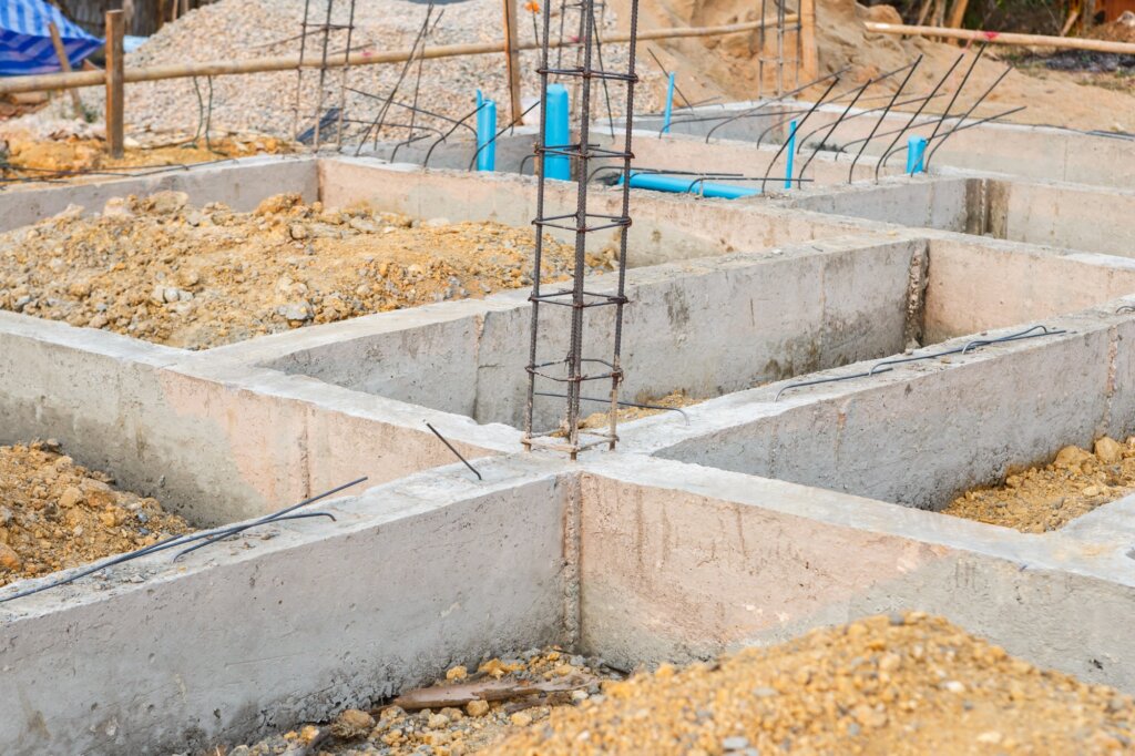 house construction with concrete beam foundation A house construction using concrete beam foundation