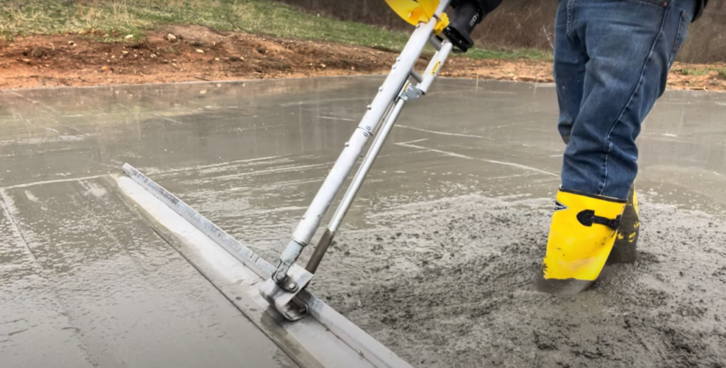 person doing concrete leveling